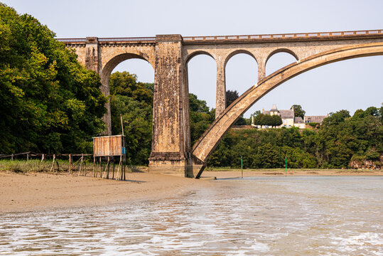 Historic Viaduc de Lessard bridge spans the River Rance near Dinan in Brittany, France