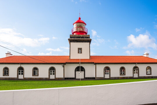 Farol da Ponta das Lajes Lighthouse stands tall on Flores Island guiding ships in North Atlantic waters
