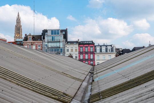 View over modern roof structure of MAS Museum with Cathedral in background in Antwerp, Belgium