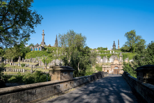 Exploring Glasgow Necropolis with its detailed structures and historical significance in the heart of the city