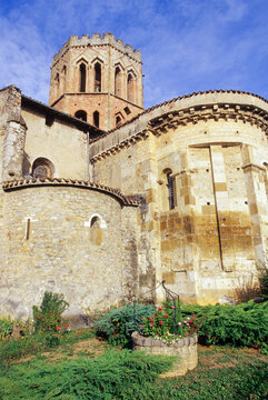 Saint-Lizier Cathedral showcases Romanesque architecture with stone walls and a bell tower in Couserans region of France