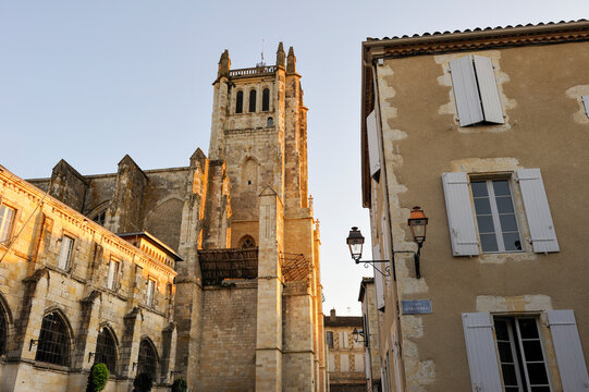 Exploring the historic architecture of a church tower in the town of Condom in Gers department of France