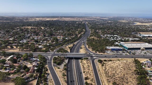 Southern Expressway, South Adelaide, South Australia: 4K aerial footage of highway traffic, road interchange, moving vehicles, urban transport in Hackham West, Noarlunga, Morphett Vale, Christie Downs