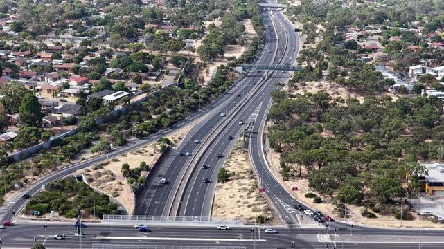 Southern Expressway, South Adelaide, South Australia: 4K aerial footage of highway traffic, road interchange, moving vehicles, urban transport in Hackham West, Noarlunga, Morphett Vale, Christie Downs