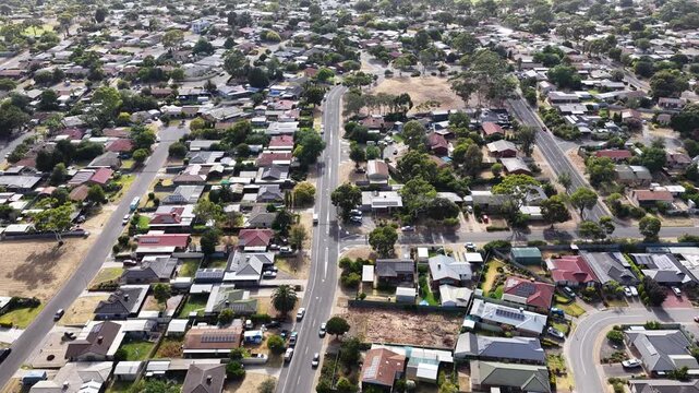 Hackham West, South Adelaide, South Australia: 4K aerial footage of residential suburb, houses, estates, streets, highways, traffic, urban infrastructure, near Noarlunga, Morphett Vale, Christie Downs