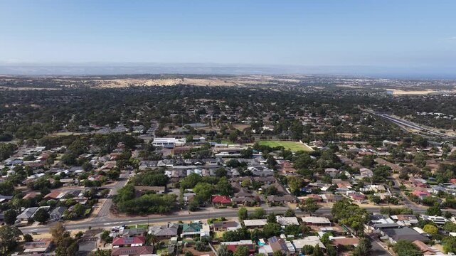 Hackham West, South Adelaide, South Australia: 4K aerial footage of residential suburb, houses, estates, streets, highways, traffic, urban infrastructure, near Noarlunga, Morphett Vale, Christie Downs