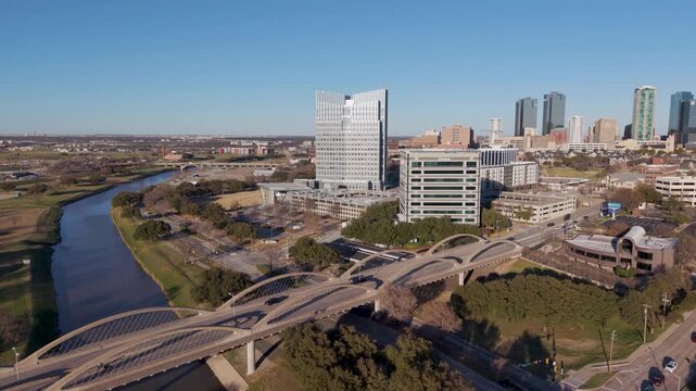 Fort Worth, Texas USA &ndash; February 18, 2026: Fort Worth City Hall and the 7th Street Bridge spanning the Trinity River with the downtown Fort Worth skyline in the background.
