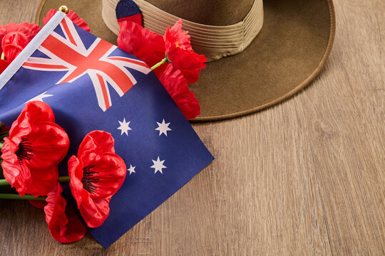 Australian flag, poppies, and slouch hat commemorating anzac day