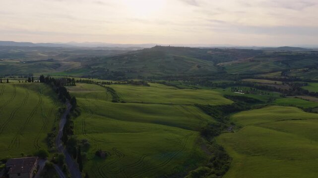 Aerial View of Cipressi di Monticchiello, Tuscany Rolling Hills at Sunset