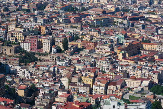 A view of the red tiled roofs of Naples on a clear, hot summer day