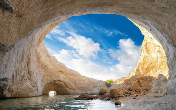 View of the volcanic open cave of Sykia, Milos island, Cyclades, Greece