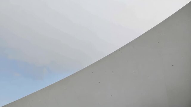 Curved concrete architectural detail and soft curved architecture ceiling with smooth white gray