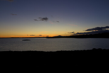 Sunset over calm reservoir © MiguelA