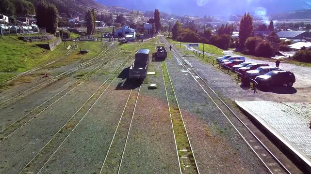 Aerial shot of the Esquel Station of the Old Patagonian Express La Trochita. Tracks, shunting yard, and old wooden wagons are visible in Patagonia Chubut.