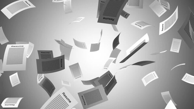 Job hunting and job loss concept. Resume or papers falling in slow motion.