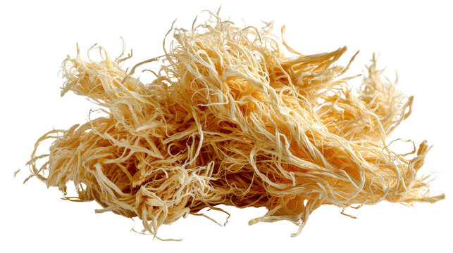 Wood wool texture: A pile of wood wool, a versatile and sustainable material, its pale strands forming a natural texture.