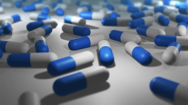  Camera Pans Across Cinematic Blue and White Pill or Drug Capsules