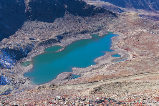 Beautiful top view of Alpather lake of Apharwat peak in Gulmarg, Jammu and Kashmir, India. showing sparkling blue water. Trekking, One day trek, Kashmir tourism concept.