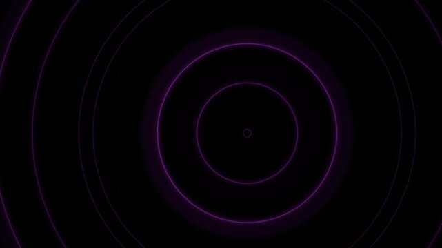 Glowing purple concentric circles animation.