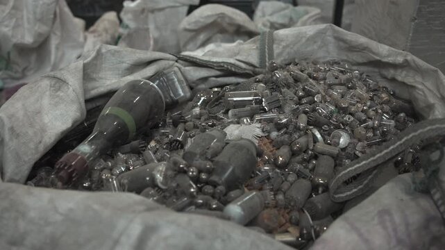Glass Hardware Collection. Closeup Of Fragile Glassware And Metallic Elements In Dim And Cautious Environment . Media