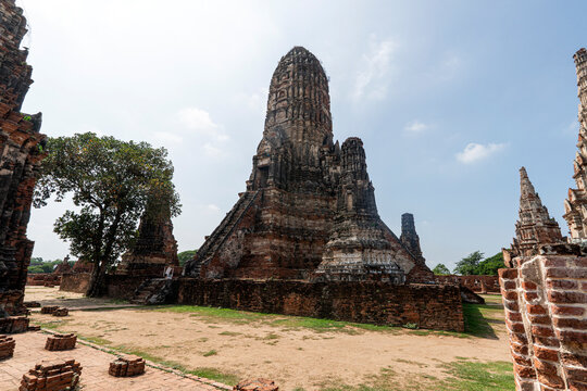Towers prangs of Wat Chaiwatthanaram in Ayutthaya, Thailand. Scenic ruins of buddhist temple in the ancient city of the Ayutthaya Kingdom Siam. Thailand is a popular tourist destination of Asia.