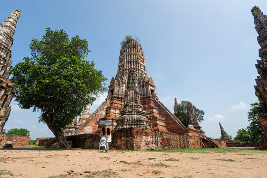Towers prangs of Wat Chaiwatthanaram in Ayutthaya, Thailand. Scenic ruins of buddhist temple in the ancient city of the Ayutthaya Kingdom Siam. Thailand is a popular tourist destination of Asia.