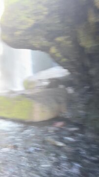 Walking through the narrow canyon to Gljufrabui waterfall, first-person POV, South Iceland