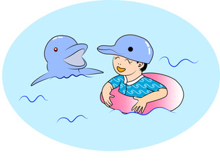 イルカと触れ合う浮き輪をつけた男の子 © Koko Ohtani