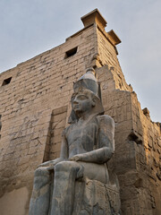 Obraz premium Close-up of seated colossal statue of Ramses II at Luxor Temple, Egypt