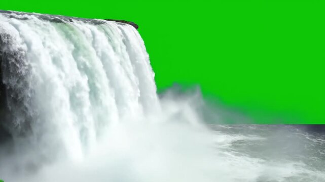 Waterfall with white mist on green chroma key background in natural scenery for video editing
