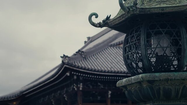 Close perspective of temple roof in Kyoto with traditional design elements