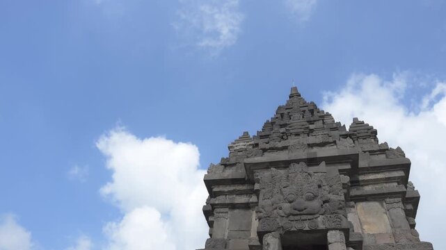 A 4K cinematic of Prambanan Temple during sunny weather, located in Yogyakarta. The largest Hindu temple complex in Indonesia, built in the 9th century AD by the Sanjaya Dynasty.