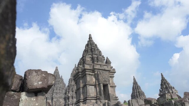 A 4K cinematic of Prambanan Temple during sunny weather, located in Yogyakarta. The largest Hindu temple complex in Indonesia, built in the 9th century AD by the Sanjaya Dynasty.