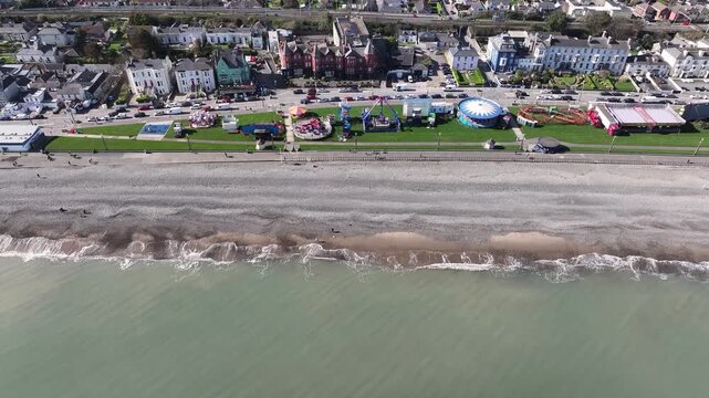 Bray coastal town, beach and main street with promenade, sunny day. Holiday in Ireland. Aerial drone