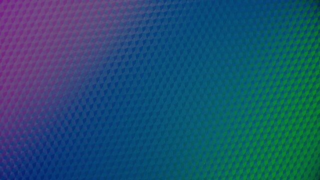 Halftone Gradient Texture Abstract. Seamless loop of dotted halftone pattern surface slowly rotating with smooth color transition from pink through blue to green creating vibrant dynamic gradient.