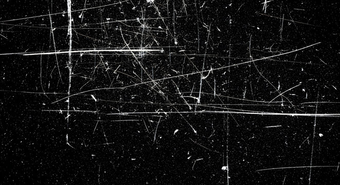 A high contrast black and white texture featuring numerous deep scratches and abrasive film dust