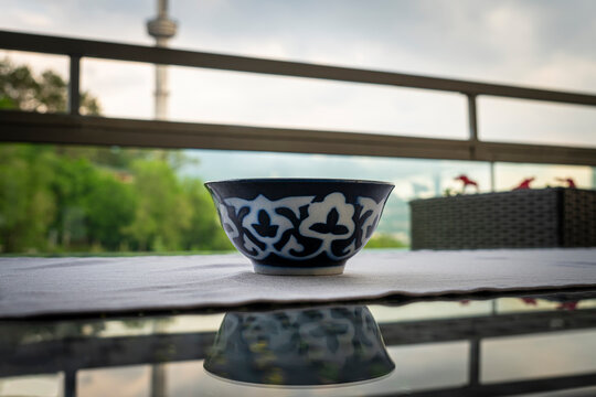 fermented milk products in a bowl on the table in a restaurant in Kazakhstan. National Asian cuisine. Camel milk-shubat on a wooden background