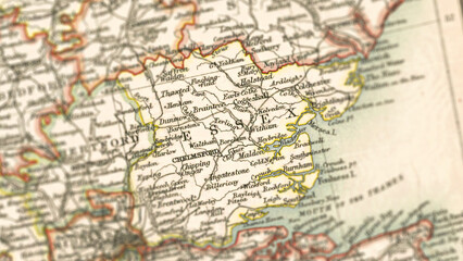 Obraz premium Macro View of Vintage Map Highlighting Essex Shire England with Detailed Regional Cartography