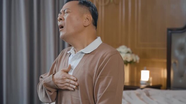 Fatigue senior man hands massage chest pain suffering with heart disease attack, anxiety, asthma, with cardiac arrest, stress or stroke, breathing issue in health risk, medical emergency and heartburn