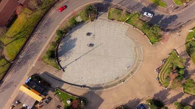 Rising overhead 4K 60FPS aerial video of C.S. Lewis Square on the Newtownards Road in East Belfast, Northern Ireland in the UK. Produced in 3840x2160 ratio and with Rec709 color.