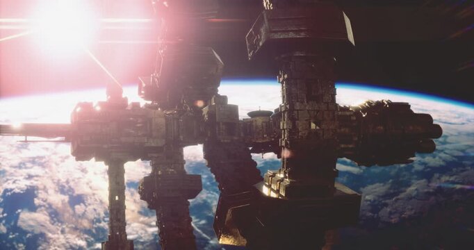 A futuristic space station hovers above Earth, illuminated by the bright sunlight from a rising sun. The planets surface reveals clouds and blue oceans below.