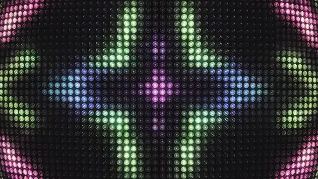 Vibrant LED Light Panel with flashing pink cross pattern and colorful background ideal for music videos and concert backgrounds.