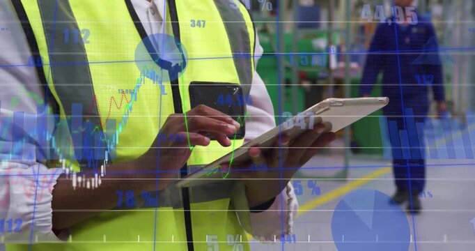 Vertical video: Tech tapping tablet on factory floor, animated charts updating for office review