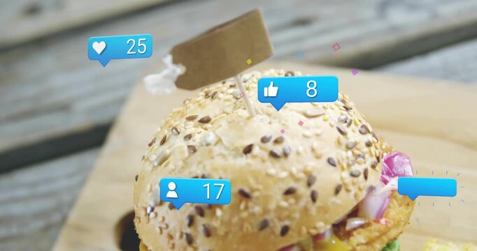 Burger drawing popping likes or comments bubbles after social spike, camera moving down to show frie