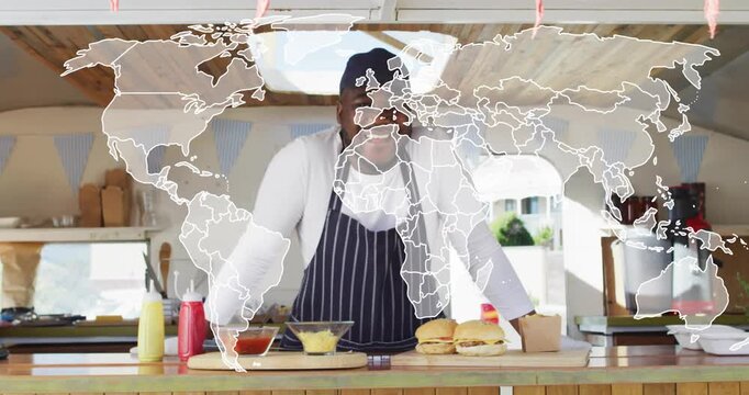 Map overlay appearing, male vendor leaning and showing burgers on stall counter for marketing