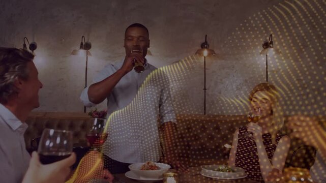 Host raising glass starting toast diners clinking wine toasting meal golden overlay across table