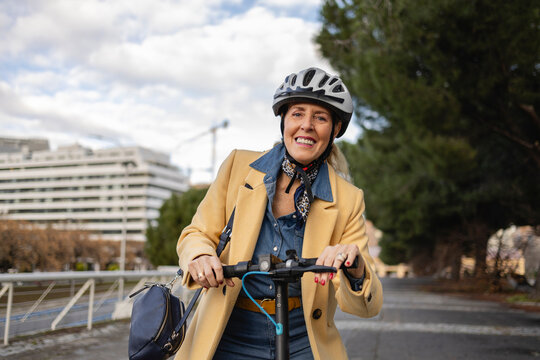 senior woman, elderly woman, electric scooter, active aging, senior mobility, modern elderly,