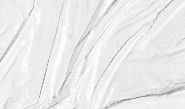Transparent wrinkled plastic, white plastic, or polyethylene bag texture, macro, no background