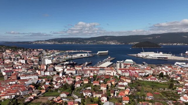 Mar&iacute;n cityscape and commercial port from aerial view
