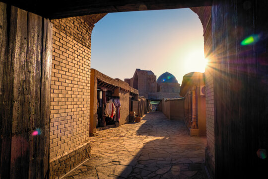 Great view of the citadel of Turkistan, Kazakhstan, through the medieval gate, with the incomplete mausoleum of Khoja Ahmed Yasawi in the background